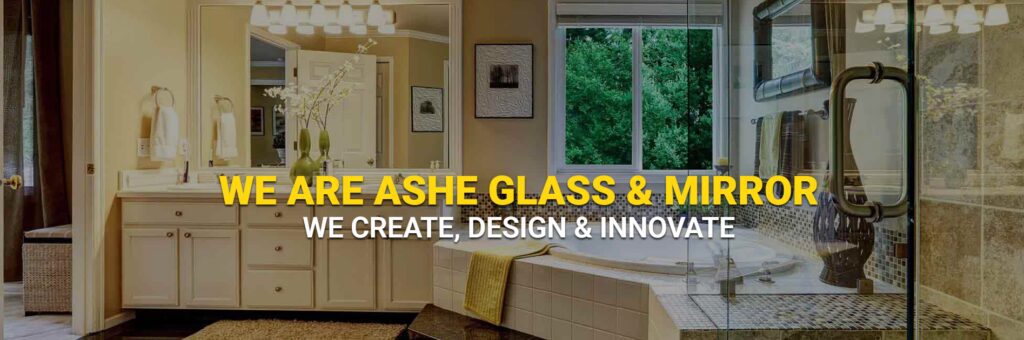 Modern bathroom with glass and mirror features.