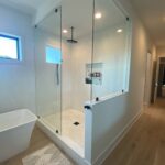 Modern bathroom with glass walk-in shower