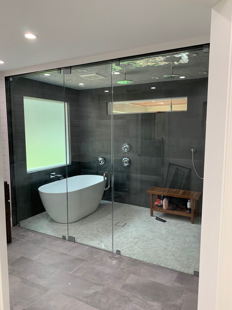 Modern bathroom with freestanding tub and glass shower