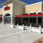 Wawa storefront and empty parking lot